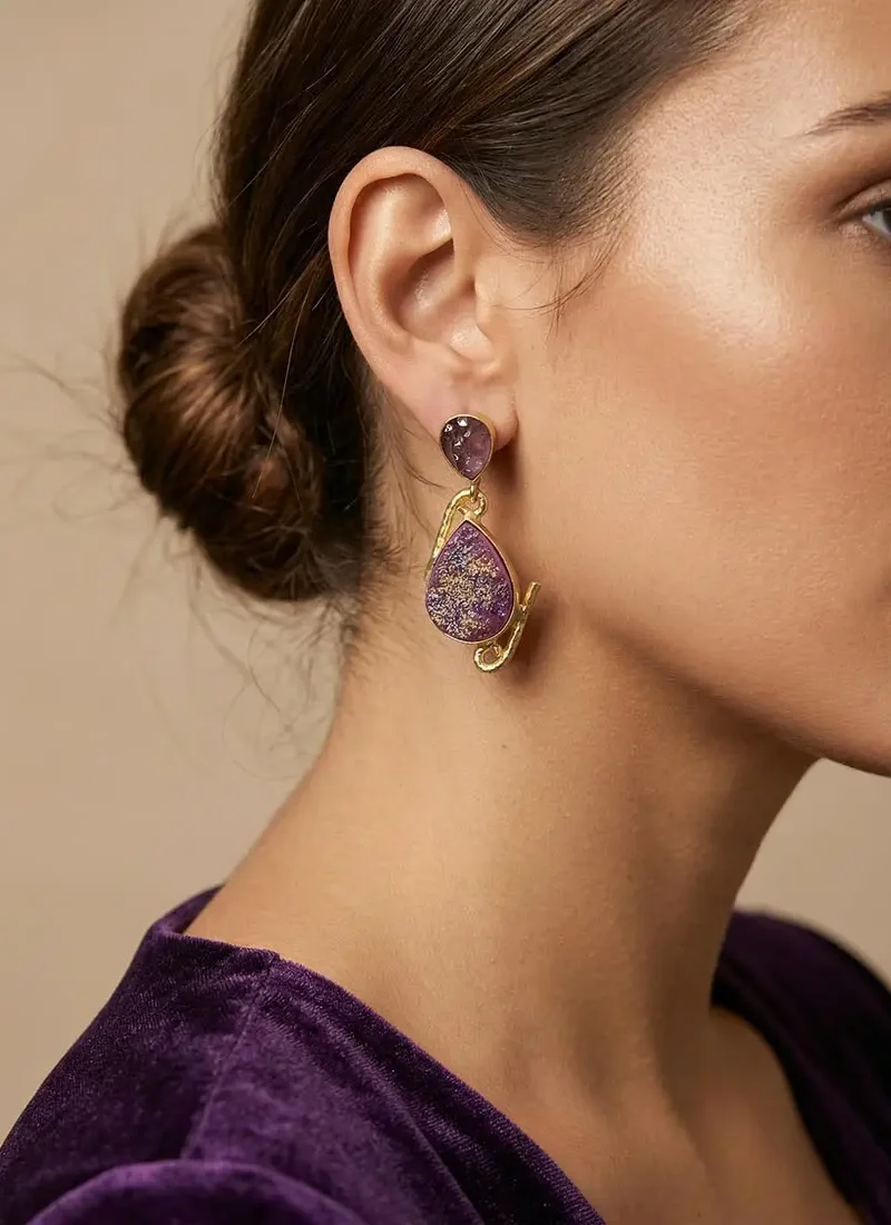 Raw Amethyst stud with druzy stone hanging earrings on a gold base.