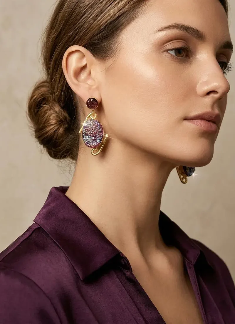 Raw Amethyst stud with druzy stone hanging earrings on a gold base.