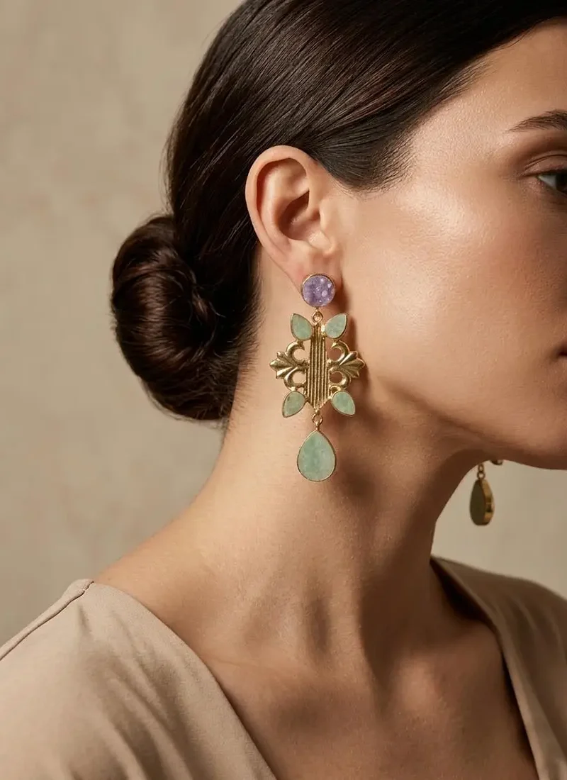 Raw amethyst and aventurine earrings with a golden base.