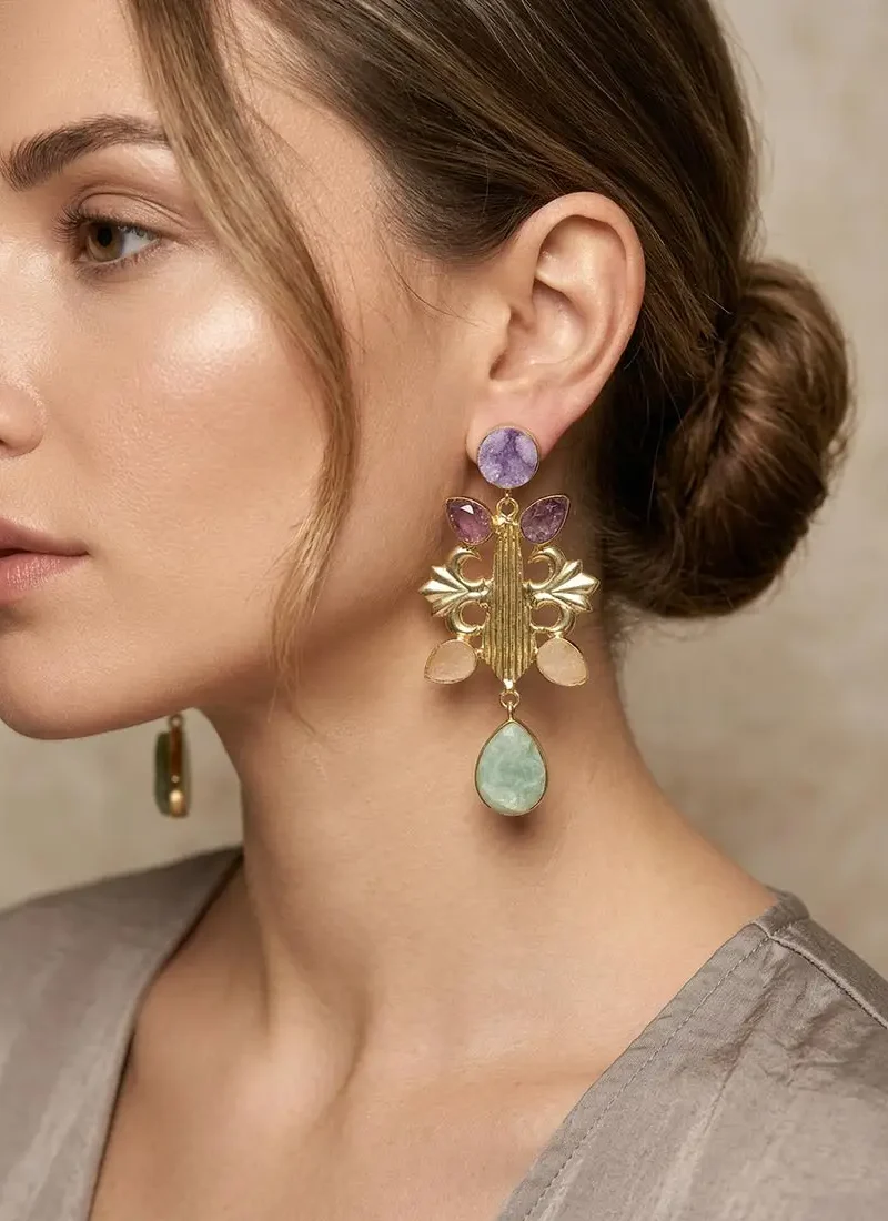 Raw amethyst, rose quartz, and aventurine earrings with a golden base.