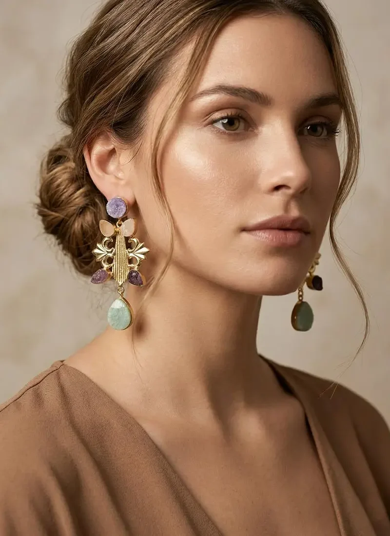 Raw amethyst, rose quartz, and aventurine earrings with a golden base.