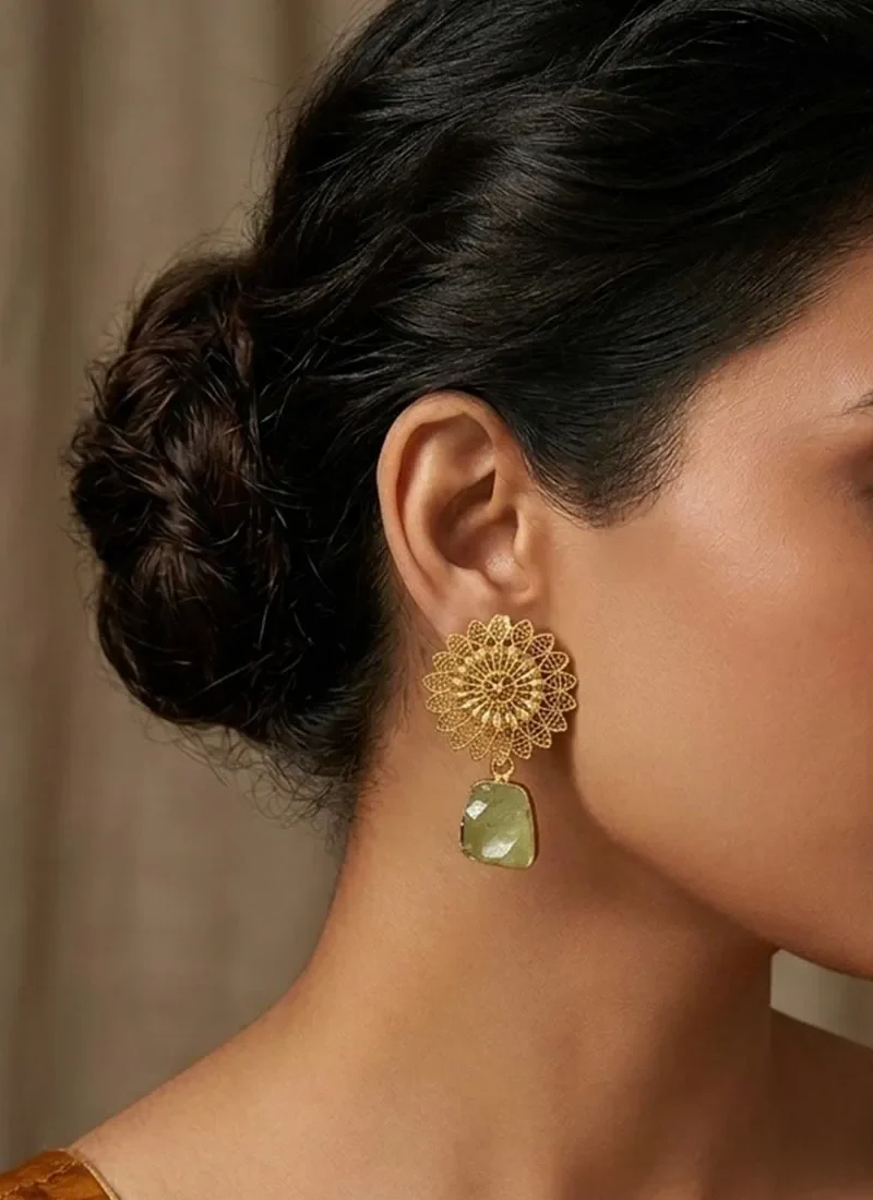 Gold floral filigree stud with raw soft green agate stone drop.