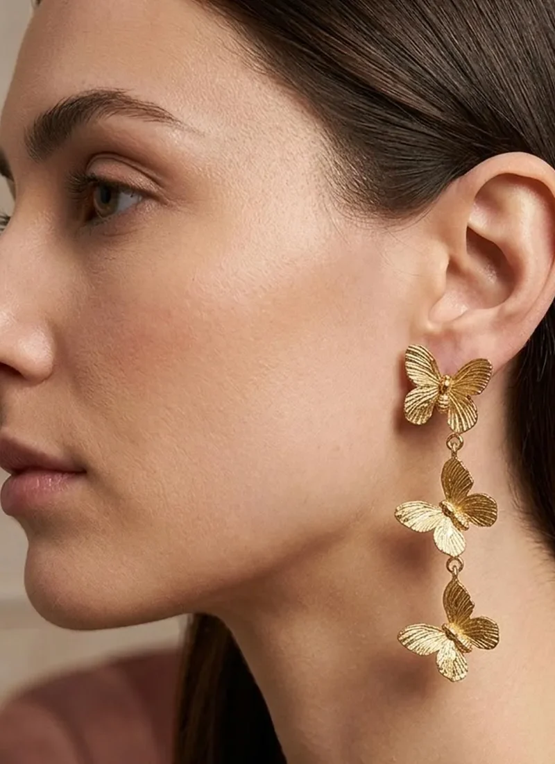 Graceful gold butterfly earrings