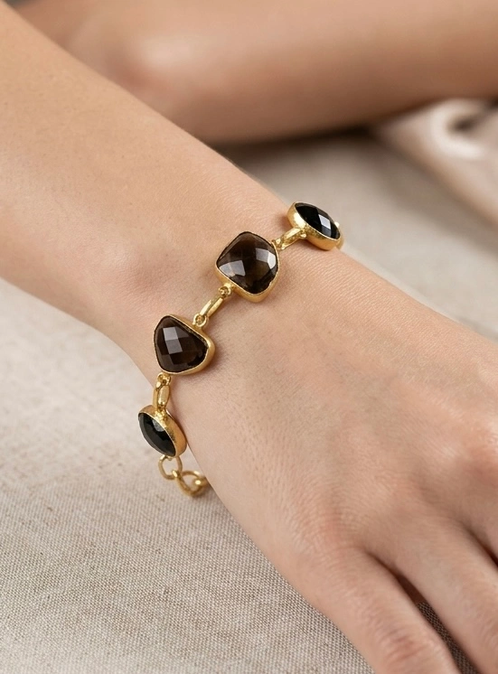 Smoking Topaz bracelet in gold-tone setting.