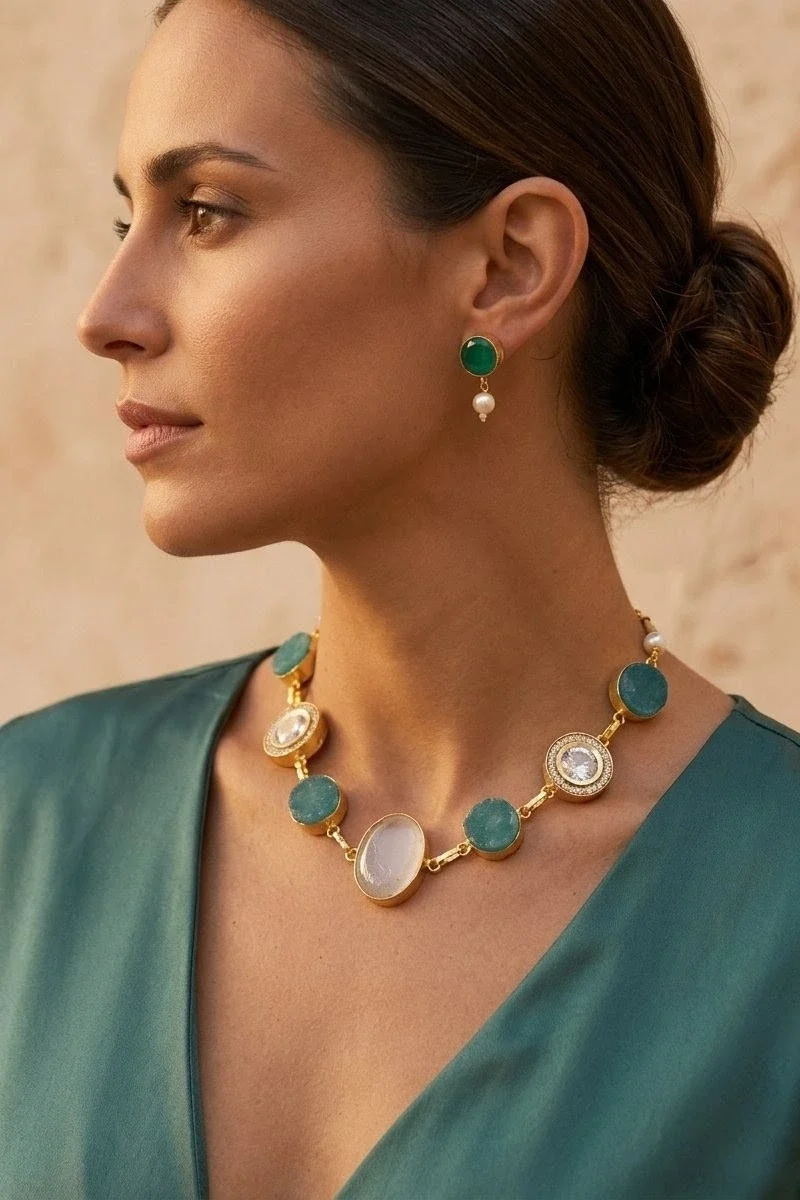 A striking blend of semi-precious green druzy, and shimmering zircon accents, paired with matching earrings.