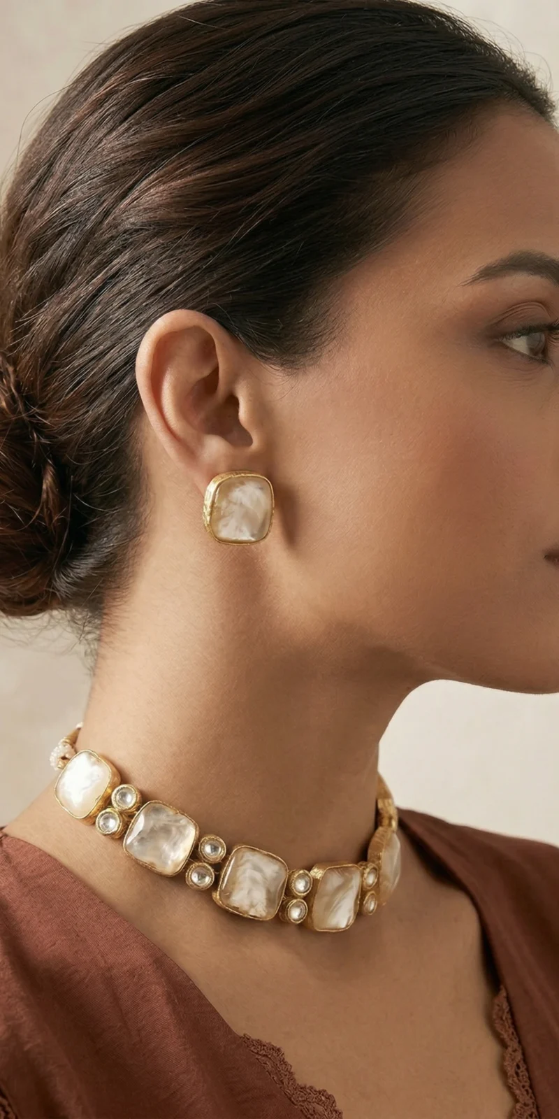 Mother of Pearl and Kundan stone necklace set with matching earrings.