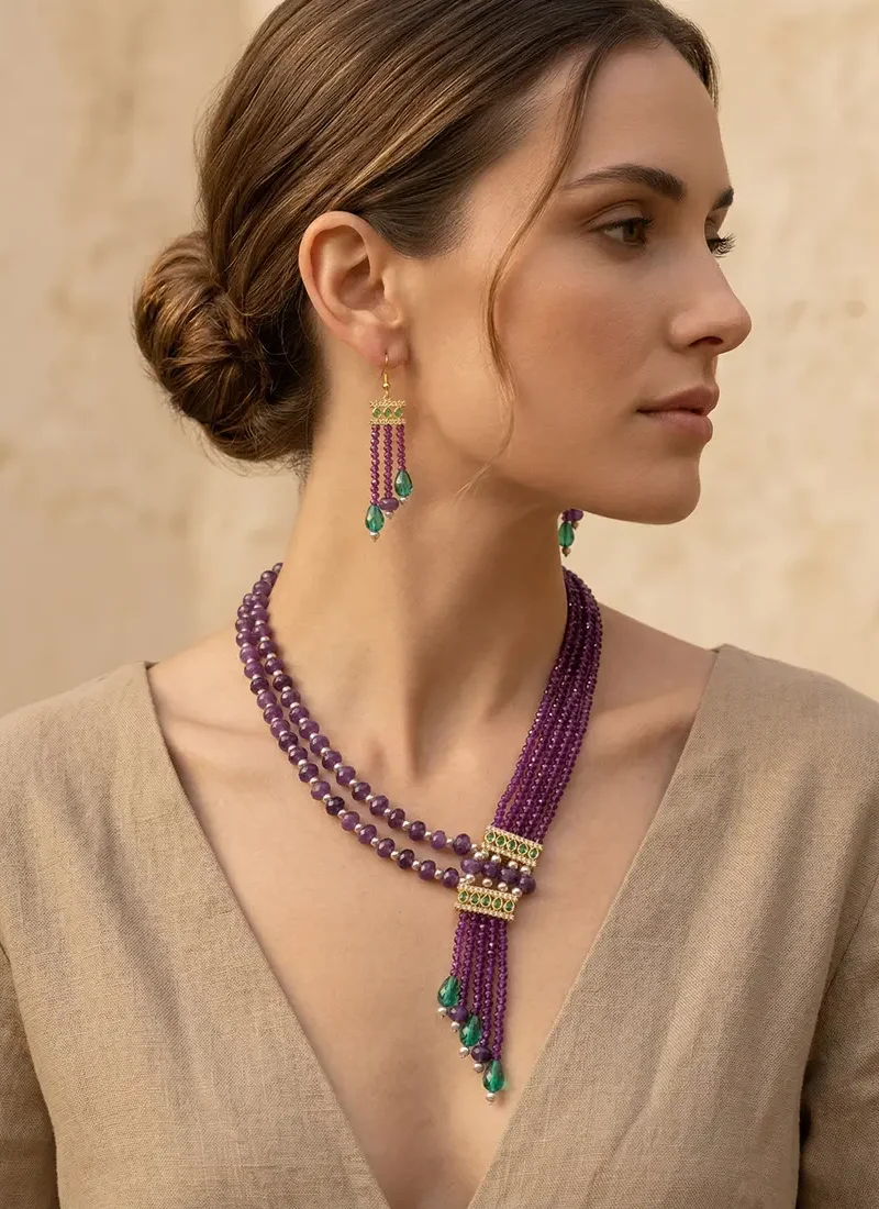 Purple crystal, amethyst-tone stones, gold base, semi-precious MOP with green crystal danglings