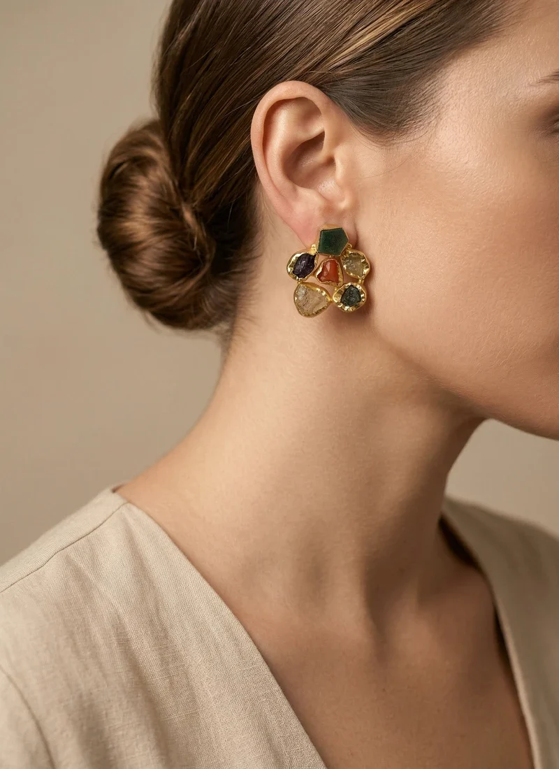 Raw semi precious stones with golden base earring