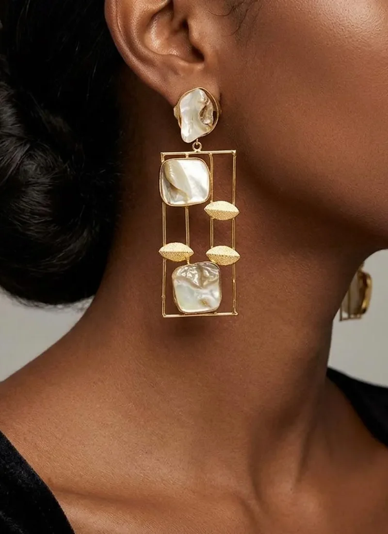 Mother of pearl earrings with gold leaf accents