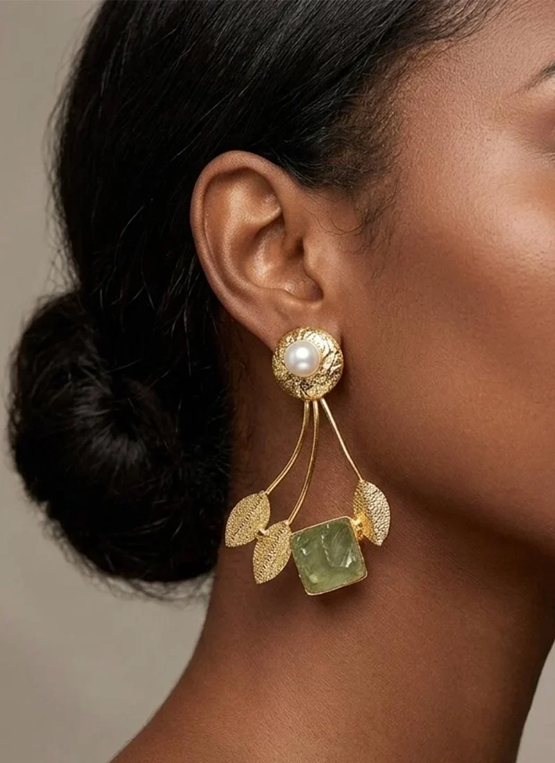 Delicate shell pearl and green aventurine earrings with golden leaf detailing.