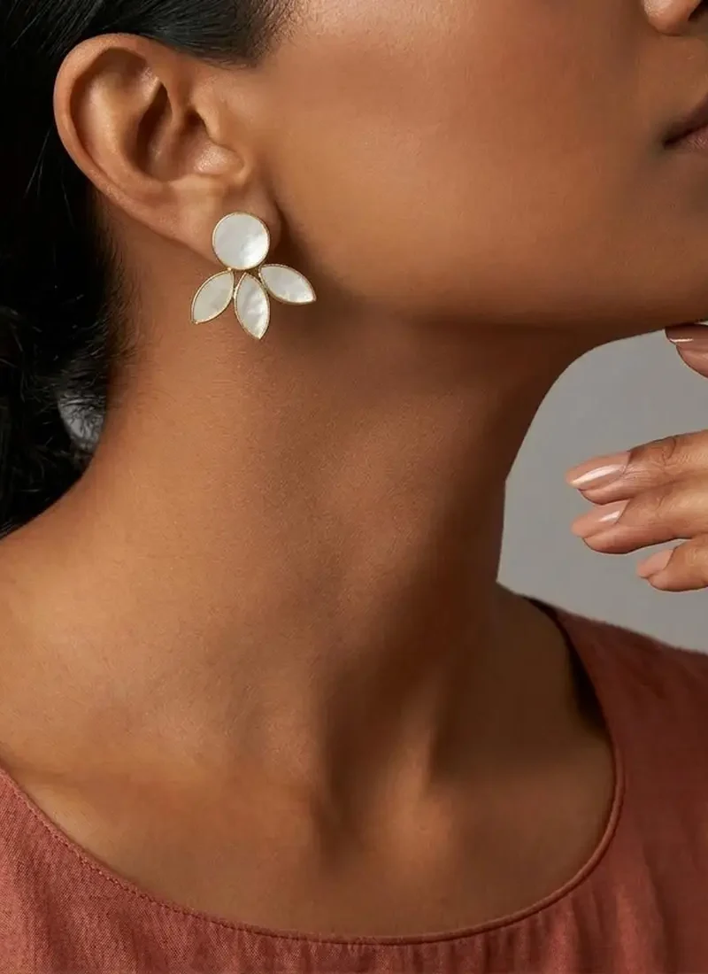 Shell pearl earrings in a delicate leaf design, set in gold